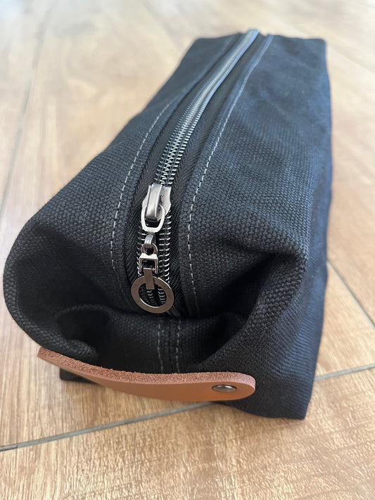 Black waxed canvas wash bag