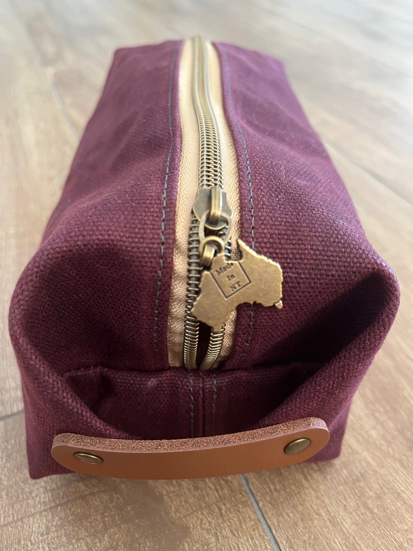 Maroon waxed canvas wash bag