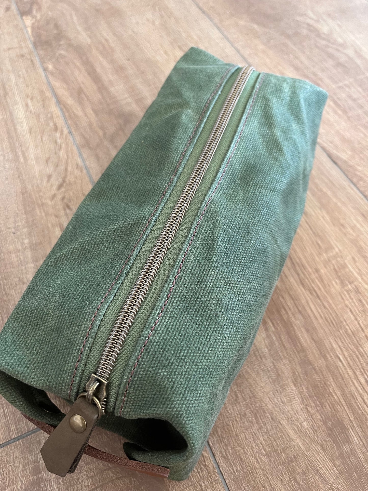 Green waxed canvas wash bag